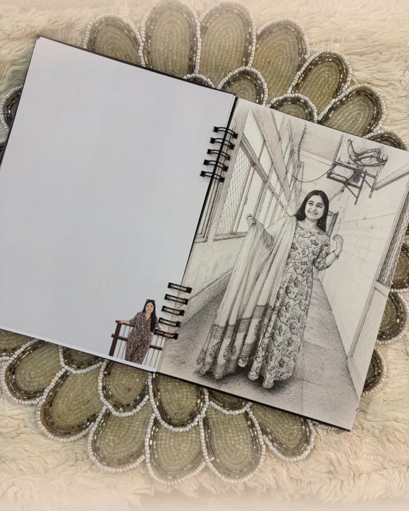 Inside pages of a personalised diary with photo spreads between the writing pages